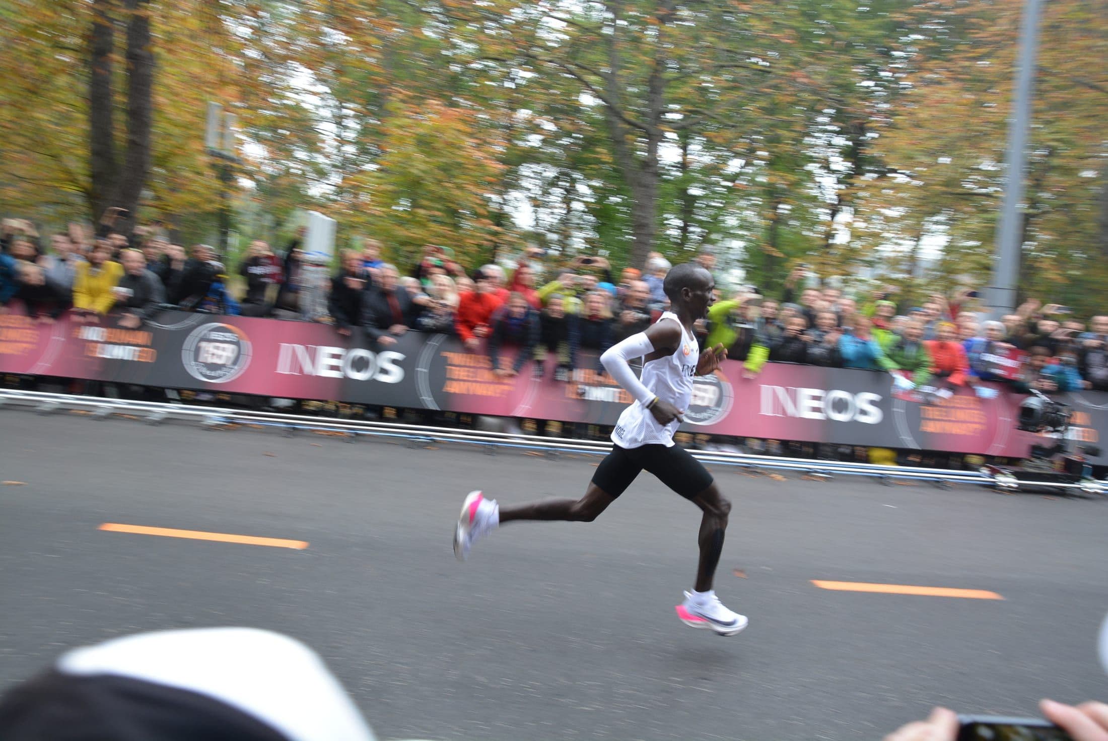 Eliud Kipchoge running past crowds during the INEOS 1:59 Challenge in Vienna, 2019