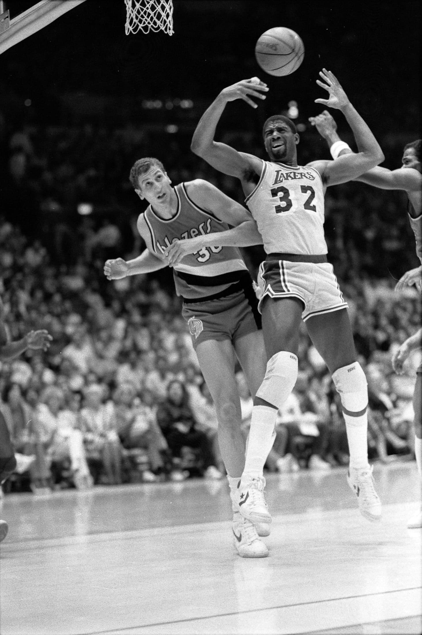 Magic Johnson playing for the Los Angeles Lakers