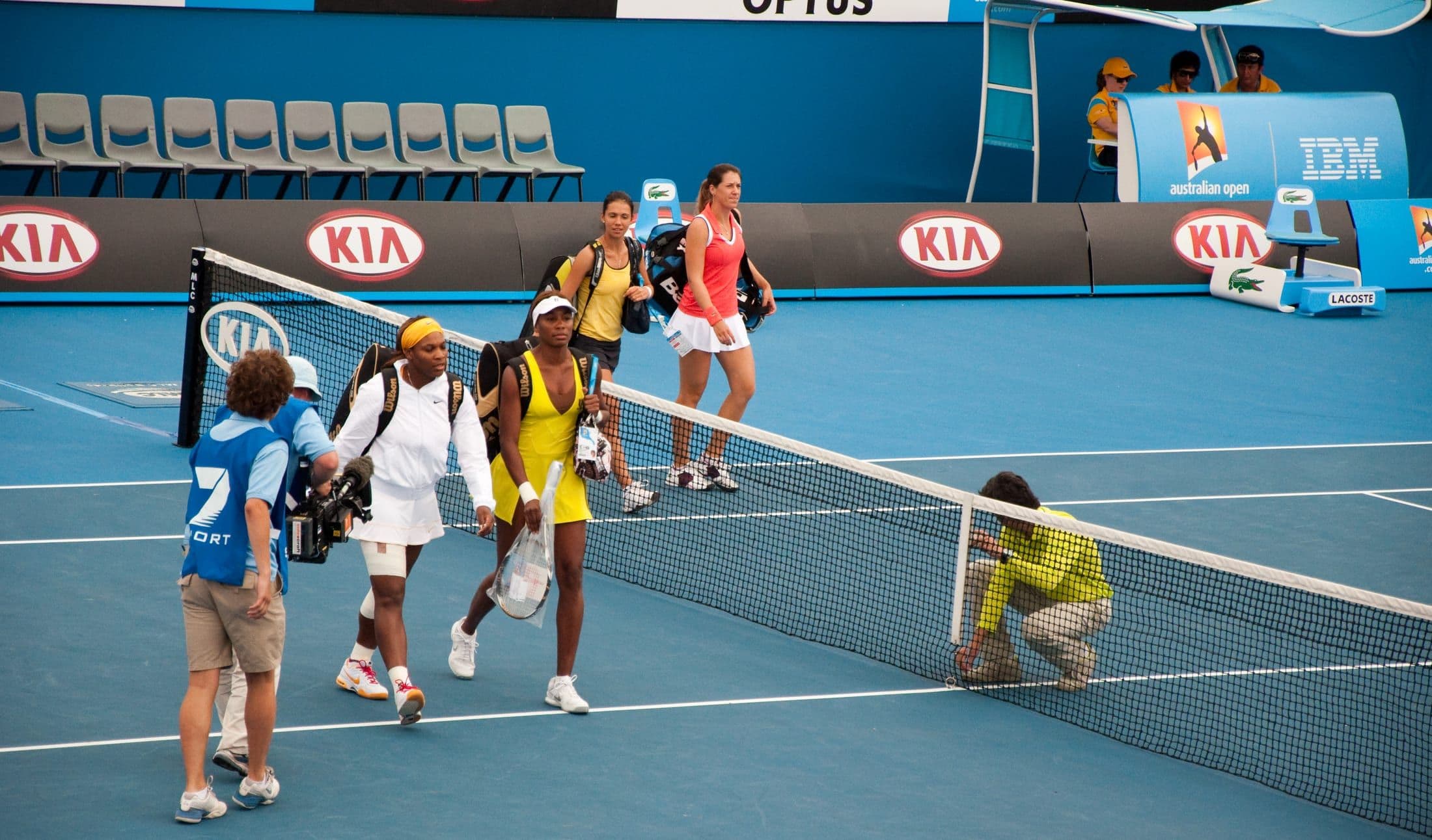 Serena and Venus Williams walking onto court together at the Australian Open