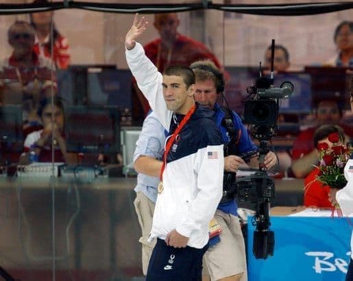 Michael Phelps competing in swimming